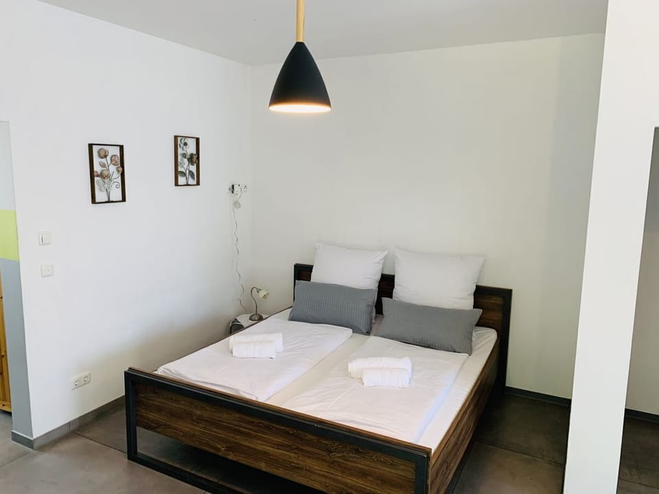 Basic Quadruple Room | Hypo-allergenic bedding available, minibar, desk, laptop workspace