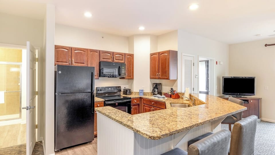 Kitchen • Full Appliances & Granite Counters