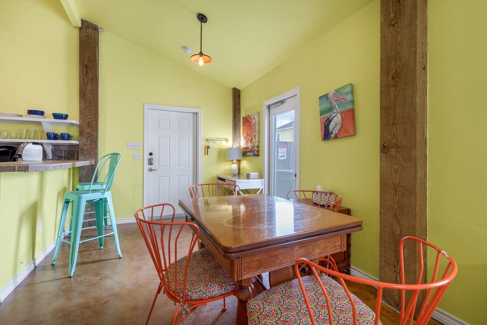 1st floor studio has dining table for 4 and 2 bar stools, access to hot tub and breezeway 