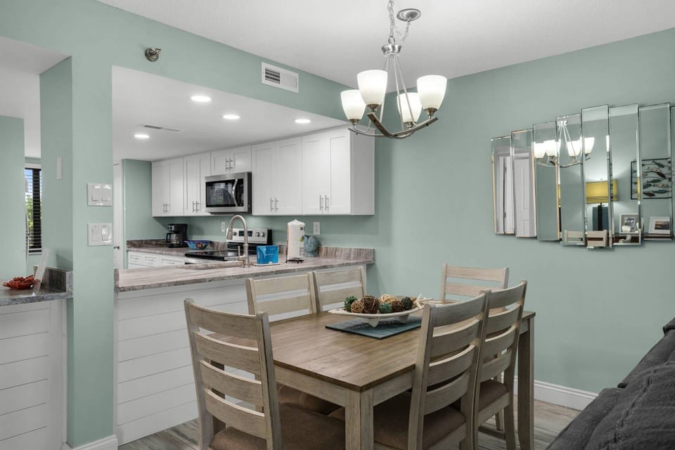Dining table has seating for 6.