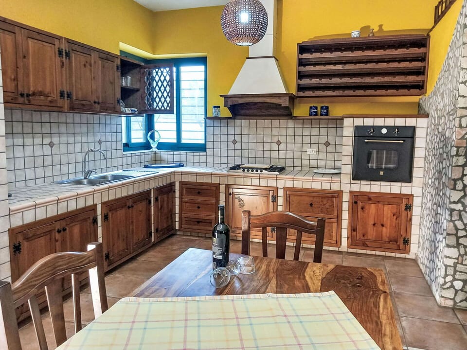 Kitchen, Countertop, Interior Design, Furniture, Flooring, Cabinetry, Kitchen Appliance, Major Appliance, Wood, Ceiling
