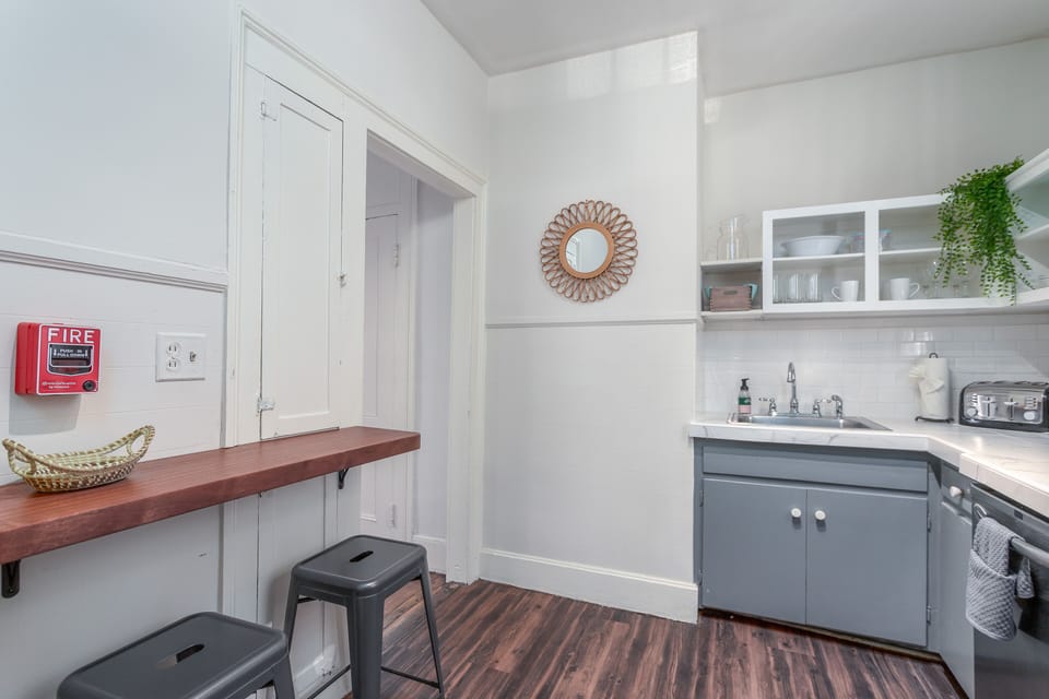Fully Equipped Kitchen and Bar Seating