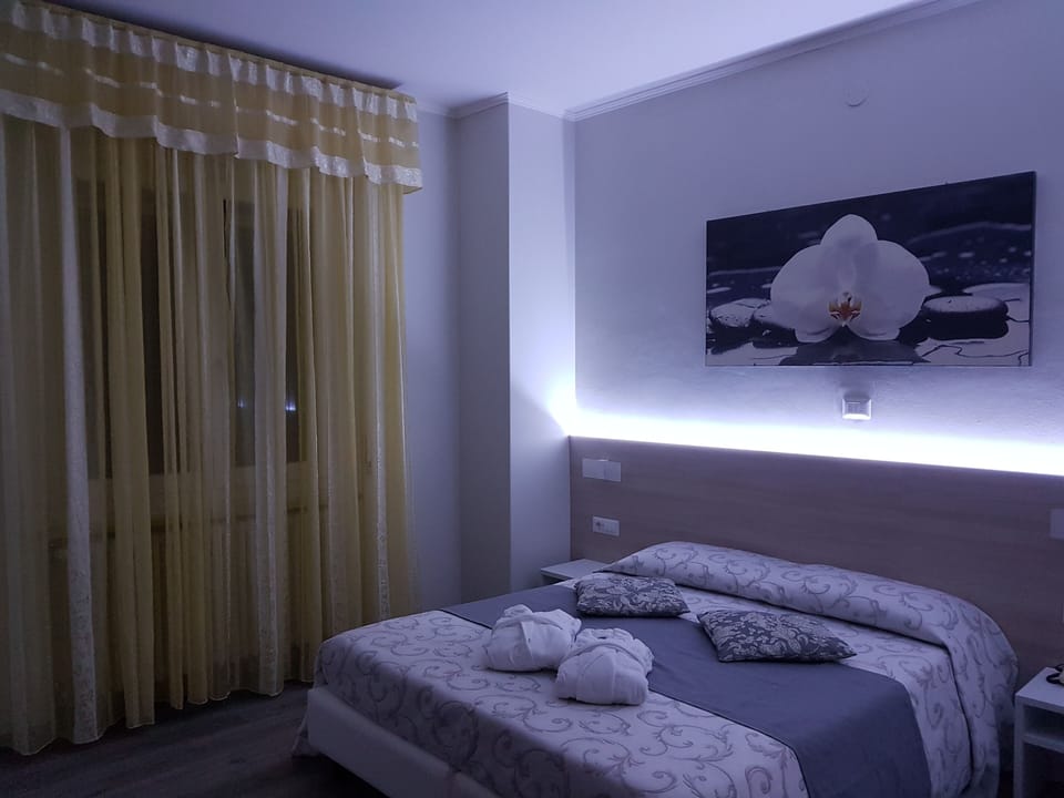 Triple Room, Air conditioning, Lake View | Frette Italian sheets, down comforters, in-room safe