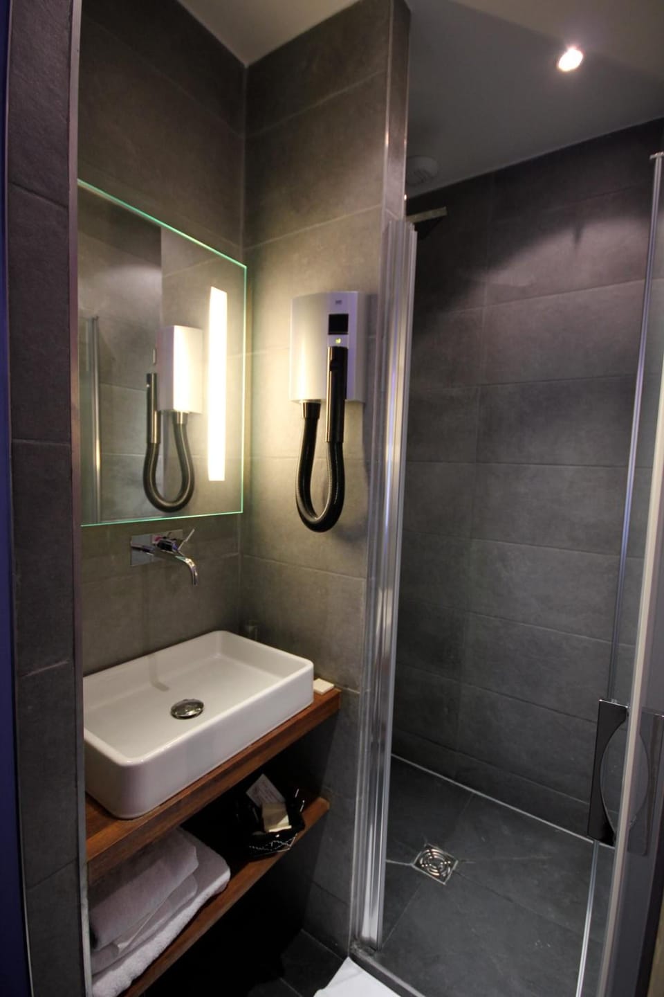 Shower, free toiletries, hair dryer, towels