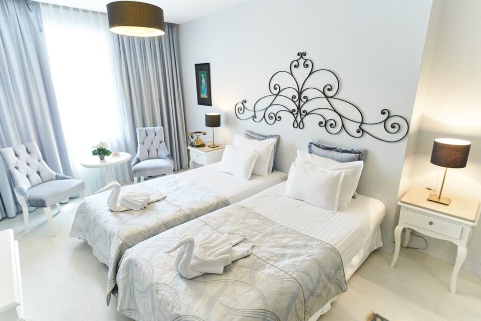 Premium bedding, down comforters, Select Comfort beds, minibar