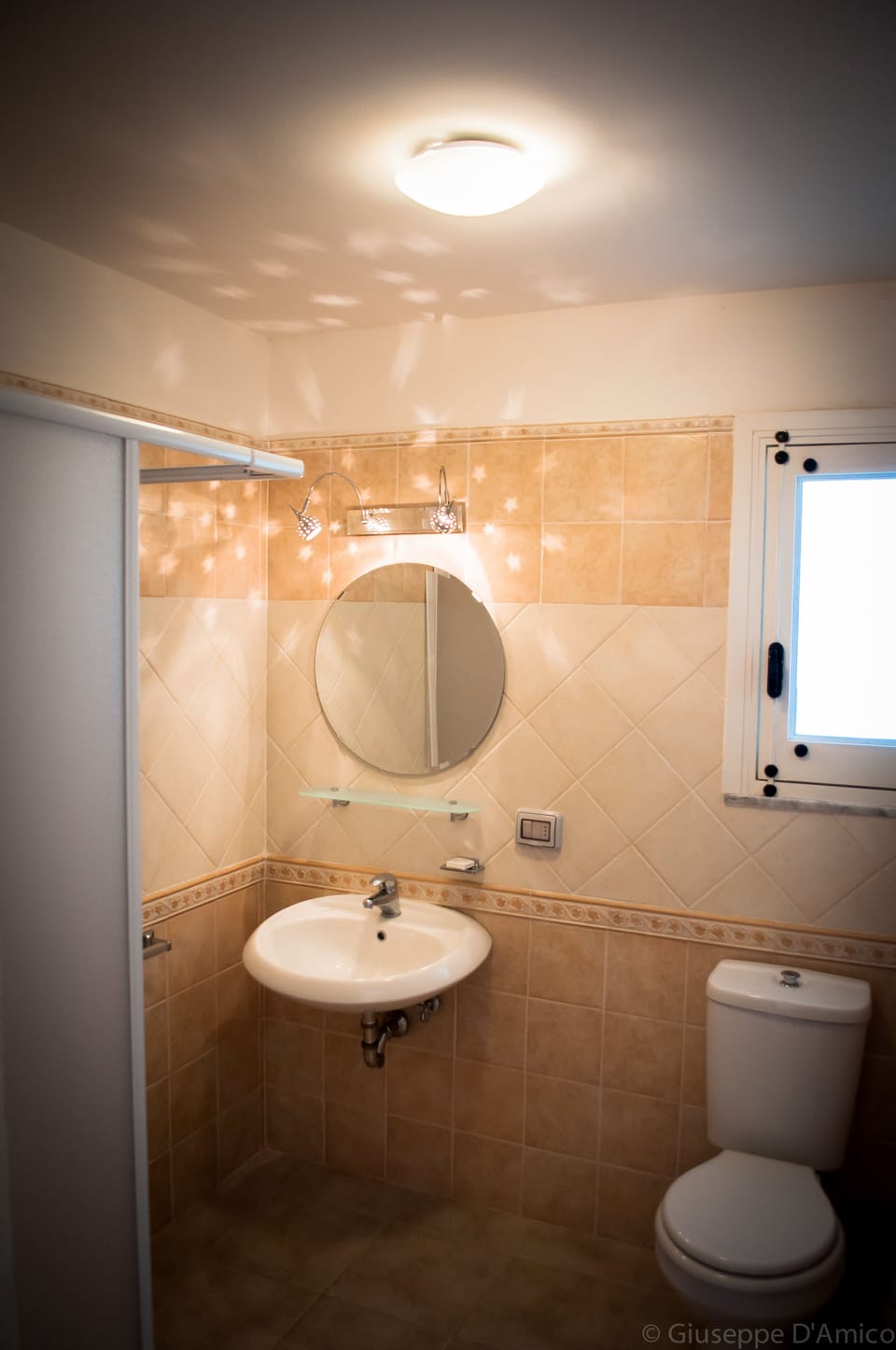 Shower, rainfall showerhead, hair dryer, towels