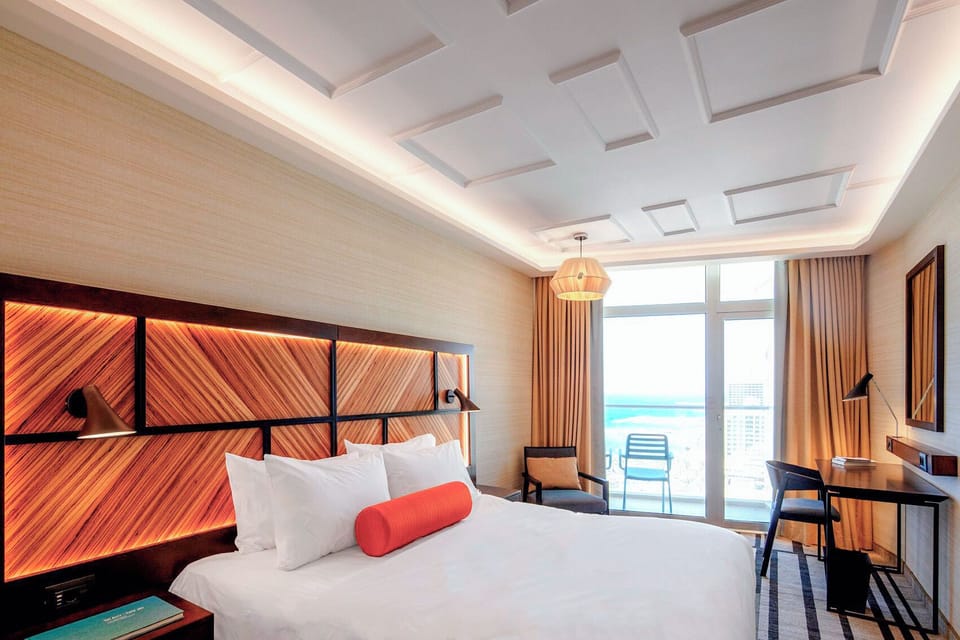 Premium bedding, down comforters, pillowtop beds, minibar