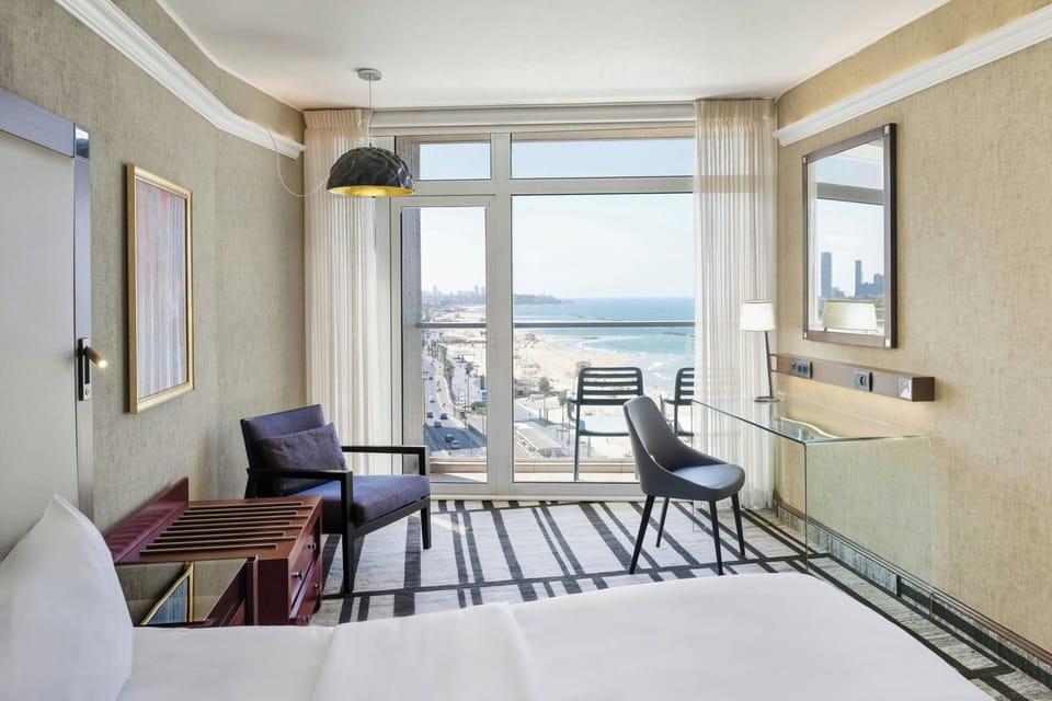 Premium bedding, down comforters, pillowtop beds, minibar