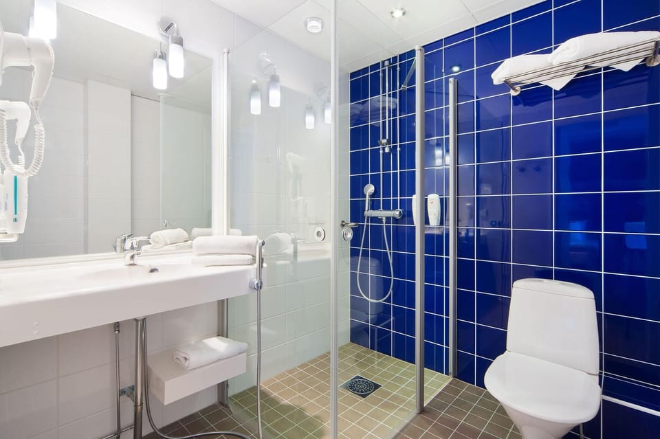 Hair dryer, towels, soap, shampoo