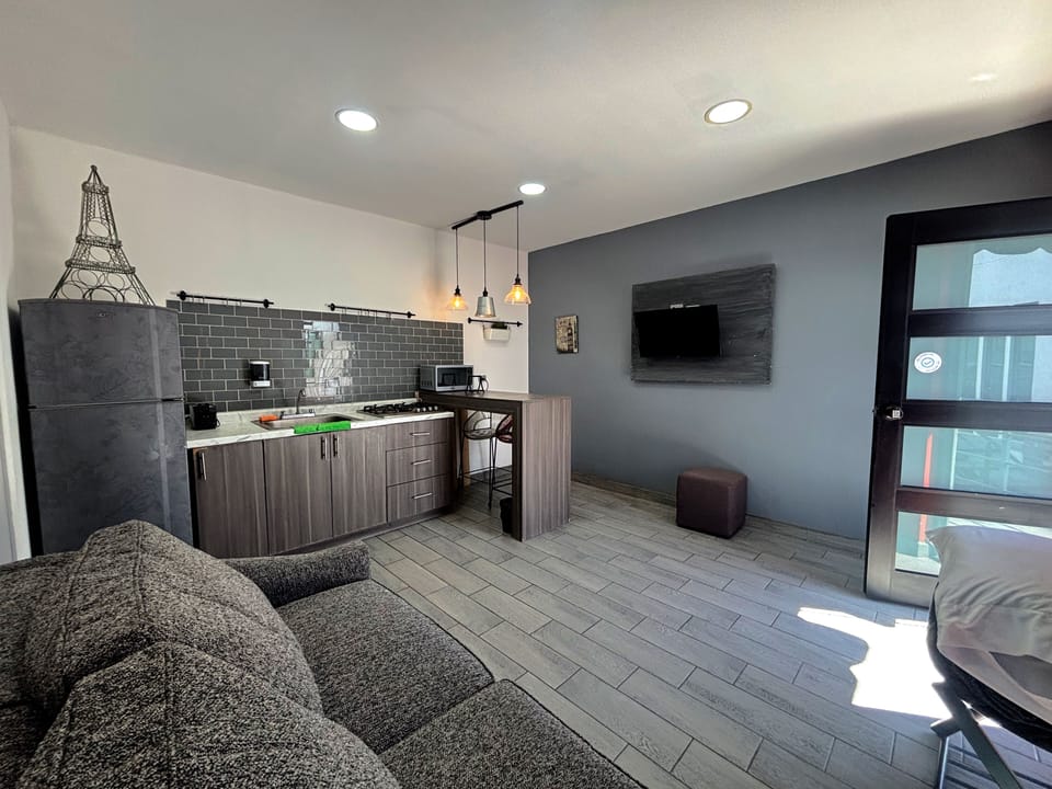 Nice & Cozy 1B TJ Border Suites 08 | Private kitchen | Full-size fridge, microwave, coffee/tea maker, toaster