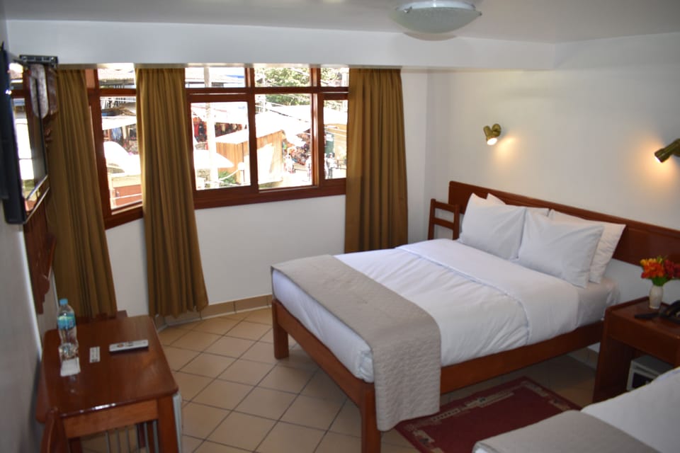 Standard Double Room, River View | 1 bedroom, in-room safe, desk, iron/ironing board (on request)