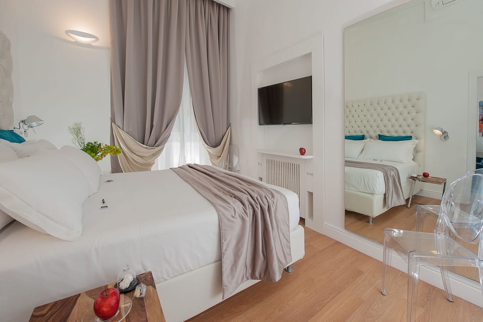 One-Bedroom Apartment (Annex: Piazza della Maddalena, 2) | Hypo-allergenic bedding, minibar, in-room safe, individually decorated