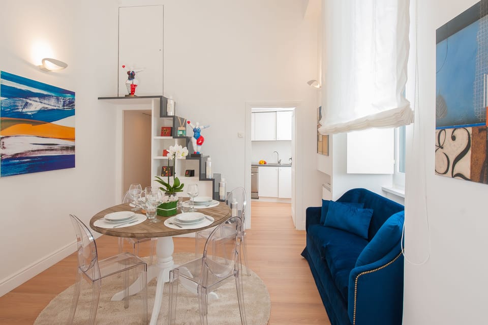 One-Bedroom Apartment (Annex: Piazza della Maddalena, 2) | Living area | LCD TV