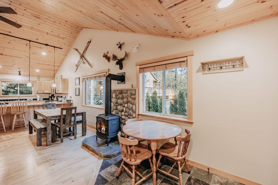 Dining table, gas fireplace and sitting area