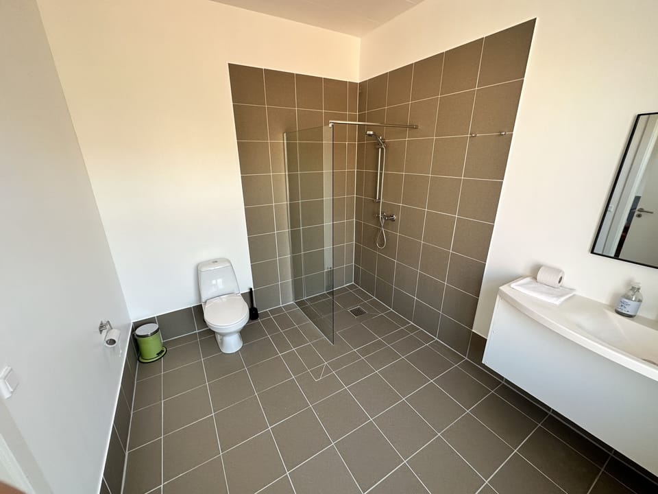 Family Suite, 2 Bedrooms | Bathroom | Shower, hair dryer (on request), towels