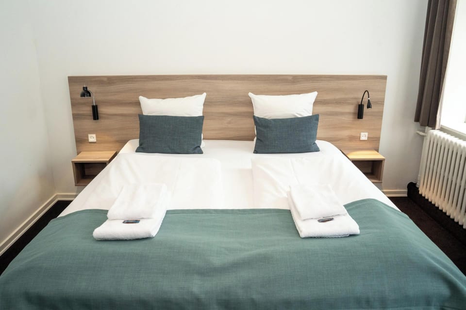 Family Quadruple Room | Desk, blackout drapes, iron/ironing board, free WiFi