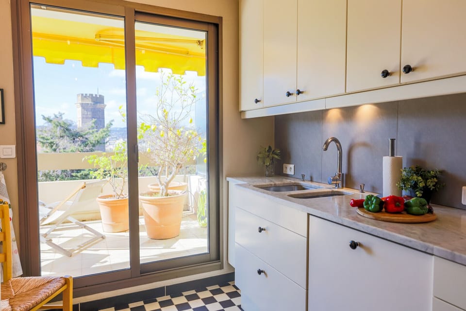 KITCHEN WITH BALCONY