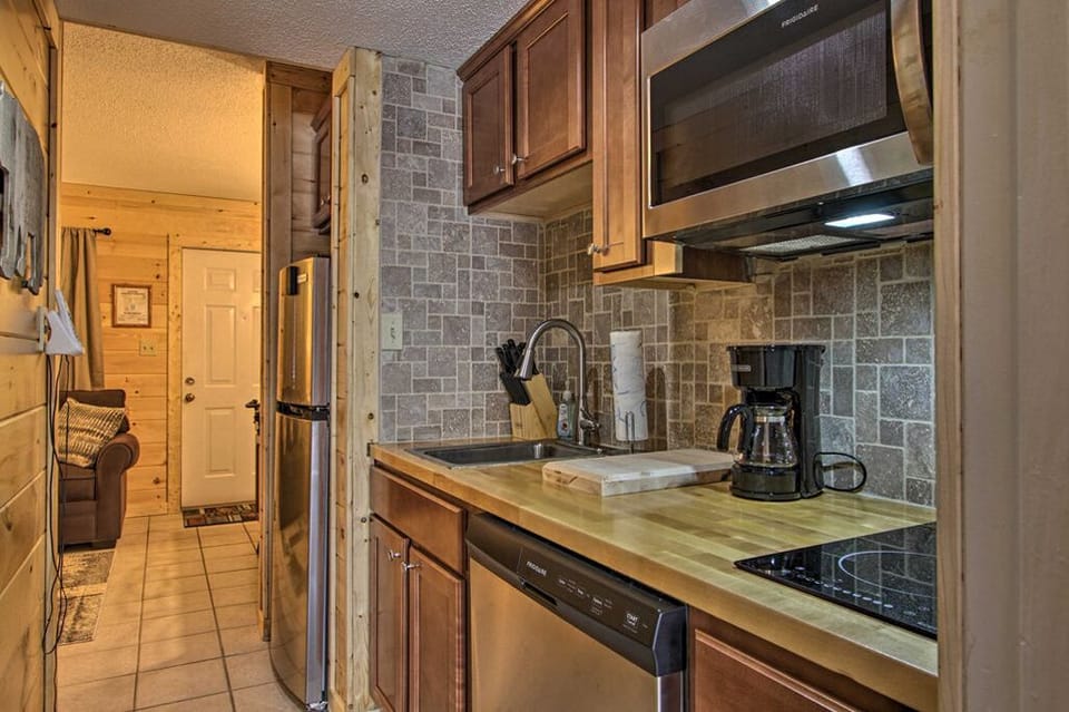 Kitchen area with Stainless Steel appliances