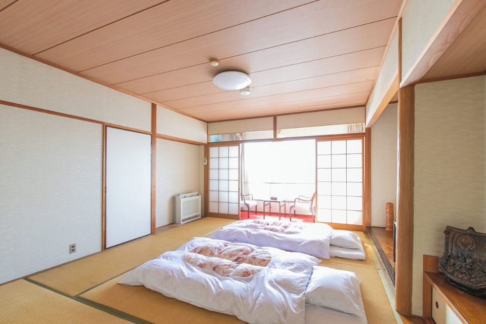 Japanese Triple Room with Shared Bathroom, Non Smoking | WiFi (free), bed sheets