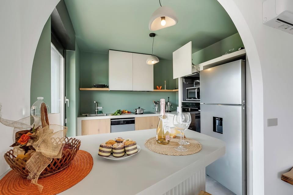 Family Apartment, Multiple Bedrooms (Appartamento Amy) | Private kitchen | Full-size fridge, microwave, oven, stovetop