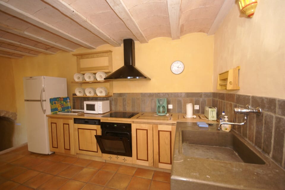 Villa | Private kitchen | Coffee/tea maker, fridge, highchair