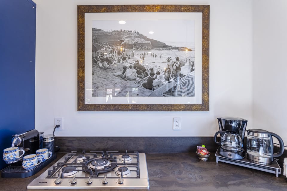 Vintage La Jolla prints in modern kitchen with all the amenities!