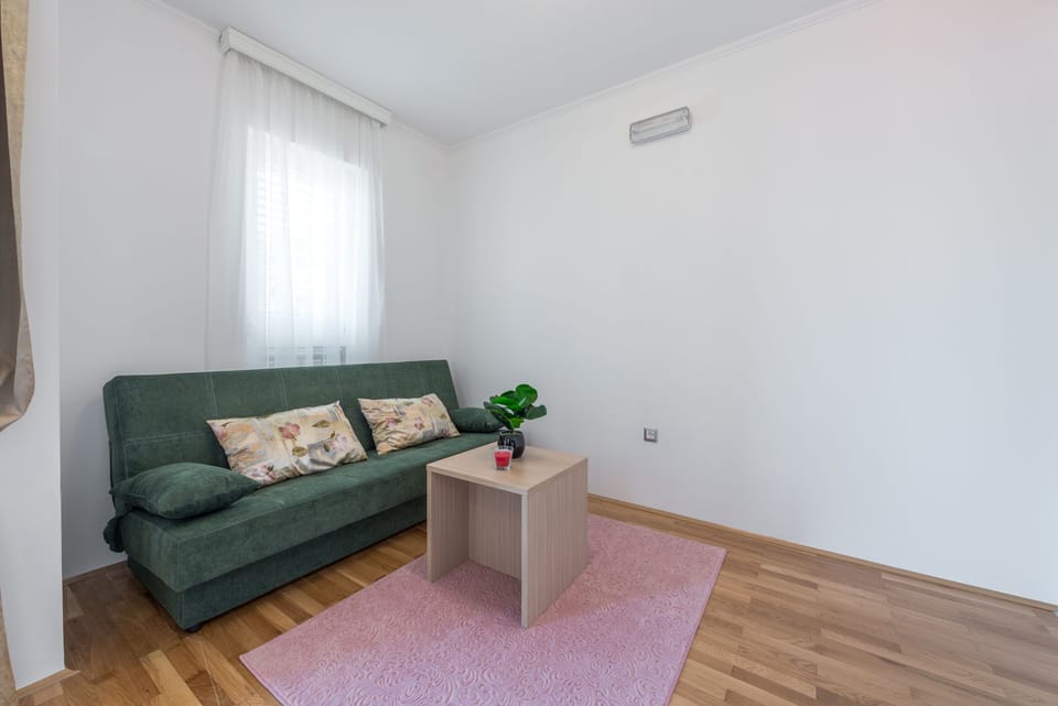 Standard Apartment, Kitchen | In-room safe, desk, iron/ironing board, bed sheets