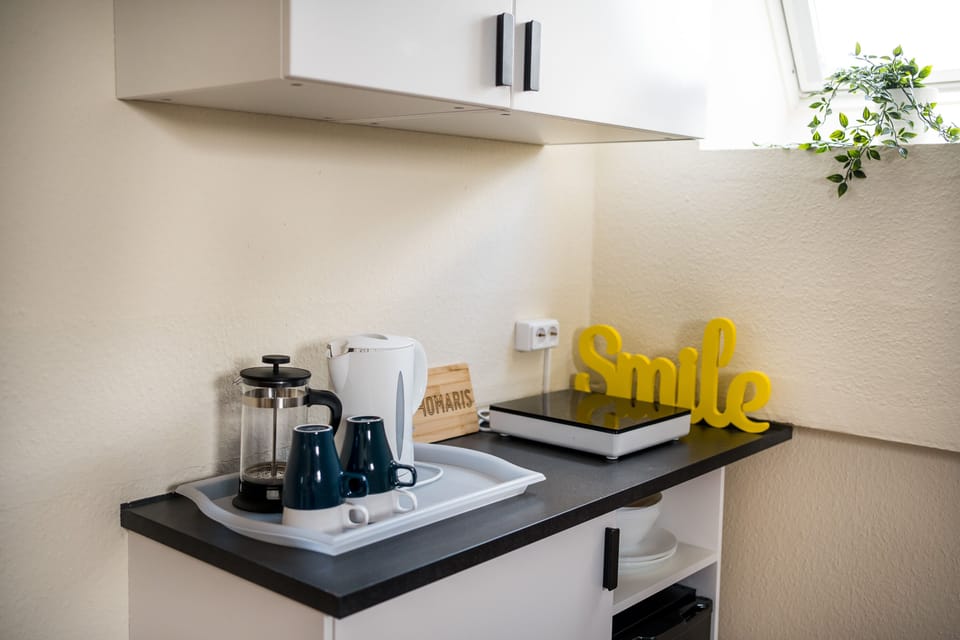 Family Quadruple Room | Private kitchen | Electric kettle