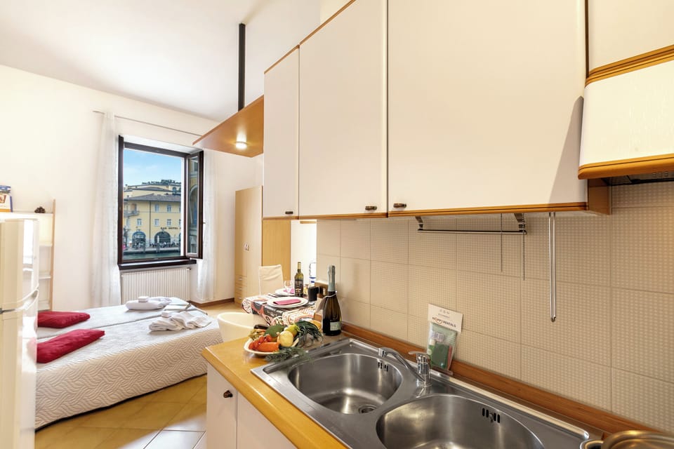 Full-size fridge, microwave, stovetop, electric kettle