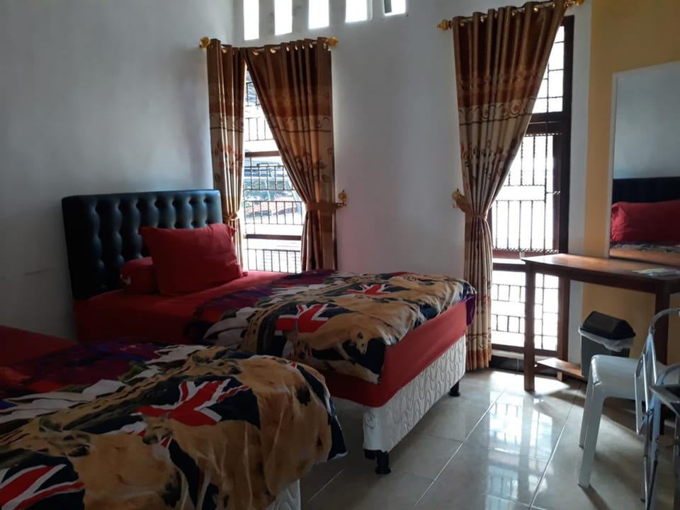 Desk, laptop workspace, free WiFi, bed sheets
