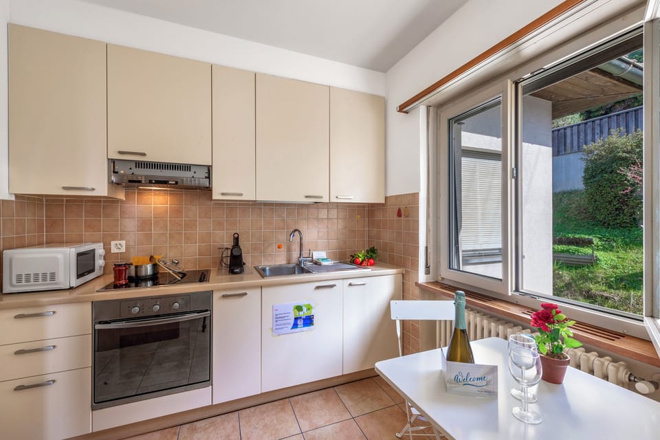 Family Apartment, 2 Bedrooms, Balcony, Lakeside (Garden on the lake 2 - Vira) | Private kitchen | Full-size fridge, microwave, oven, stovetop