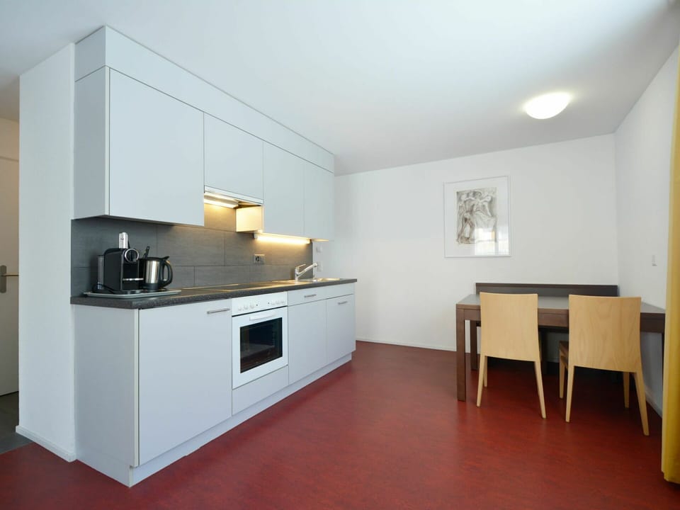 Cabinetry, Countertop, Furniture, Building, Kitchen Stove, Kitchen Appliance, Kitchen, Wood, Interior Design, Drawer