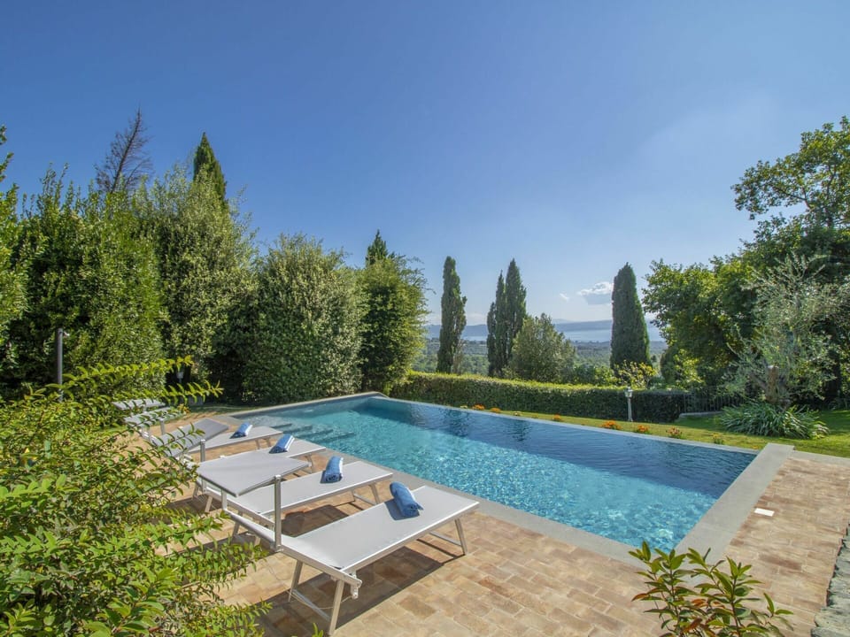 Water, Plant, Sky, Property, Swimming Pool, Azure, Tree, Vegetation, Natural Landscape, Grass
