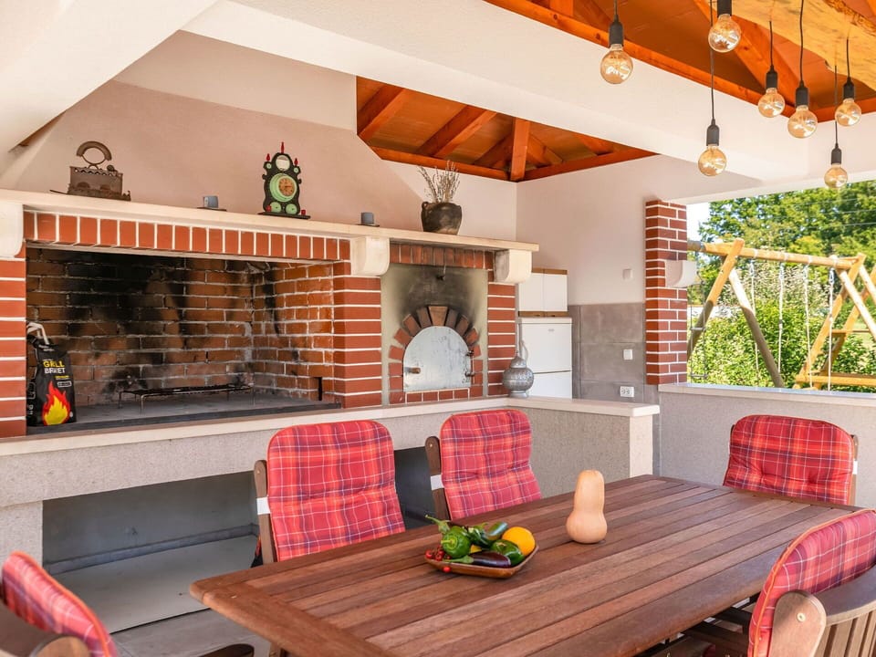 Room, Property, Interior Design, Living Room, Furniture, House, Hearth, Home, Building, Orange
