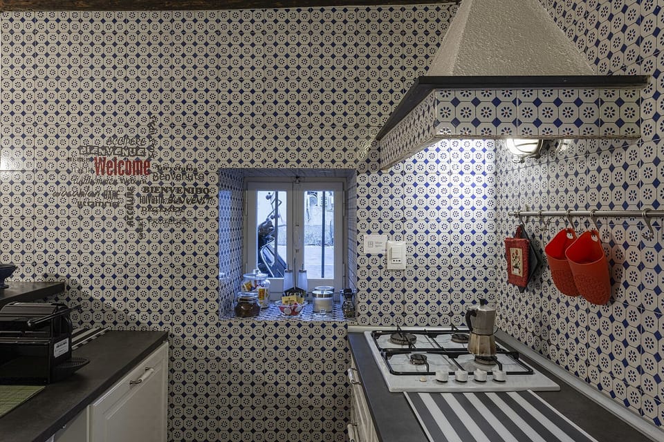 Apartment, 3 Bedrooms | Private kitchen | Full-size fridge, microwave, oven, stovetop
