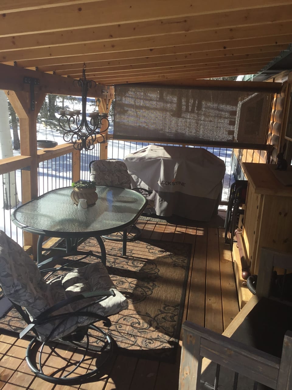 Covered outside dining are with Blackstone Grill, BBQ, and Gas Fireplace .