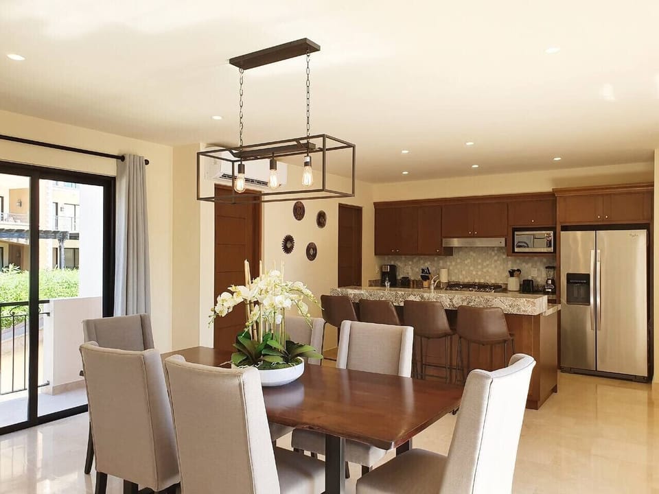 Elegant dining space that flows into the kitchen, perfect for memorable meals.