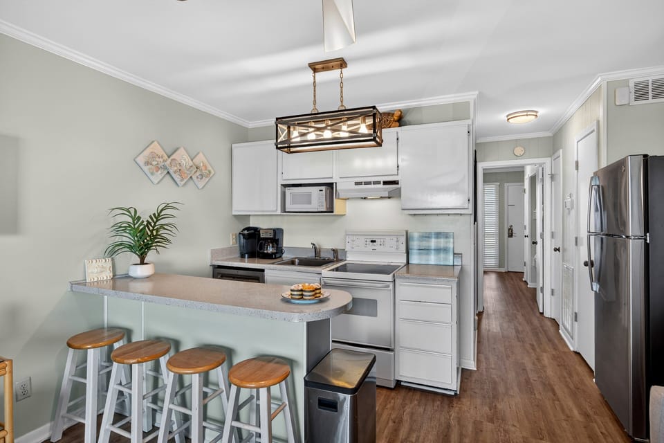 Open concept floor plan - with living room, kitchen, and dining