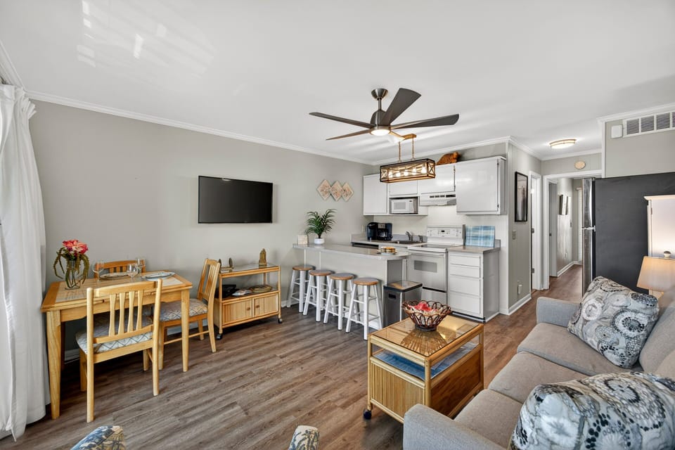 Open concept floor plan - with living room, kitchen, and dining