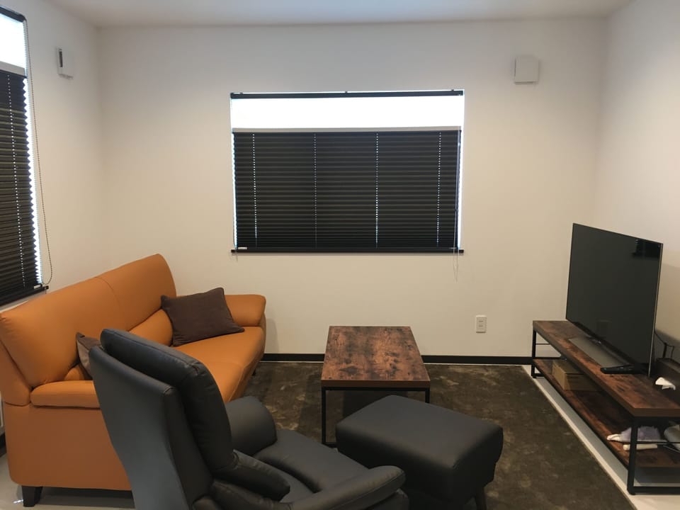 3 Bedroom House | Living area | Flat-screen TV