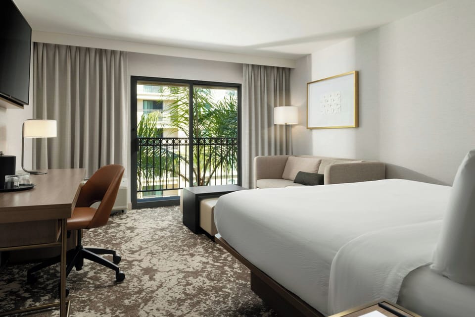 Room, 1 King Bed with Sofa bed, Balcony, Courtyard View | Premium bedding, down comforters, desk, laptop workspace