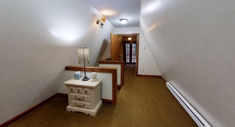 The loft area above the stairs.