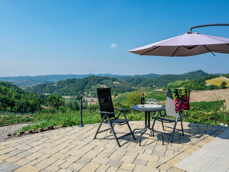 Sky, Plant, Table, Furniture, Property, Outdoor Table, Umbrella, Outdoor Furniture, Shade, Land Lot