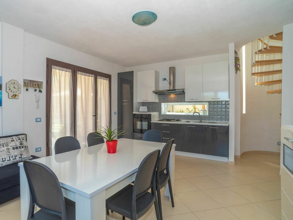 Furniture, Table, Property, Cabinetry, Countertop, Chair, Building, Wood, Kitchen, Interior Design