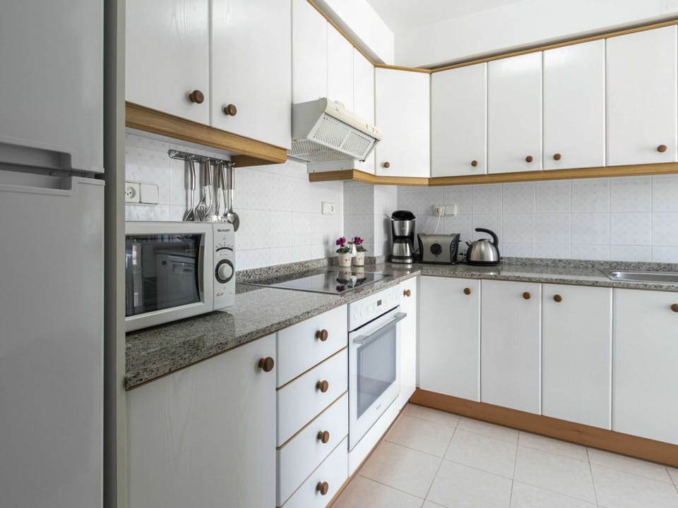 Cabinetry, Countertop, Property, Kitchen Stove, Kitchen Appliance, Sink, Kitchen, Drawer, Kitchen Sink, Cooktop