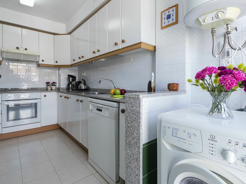 Laundry Room, Cabinetry, Property, Flower, Sink, Kitchen Sink, Plant, Washing Machine, Clothes Dryer, Kitchen Appliance