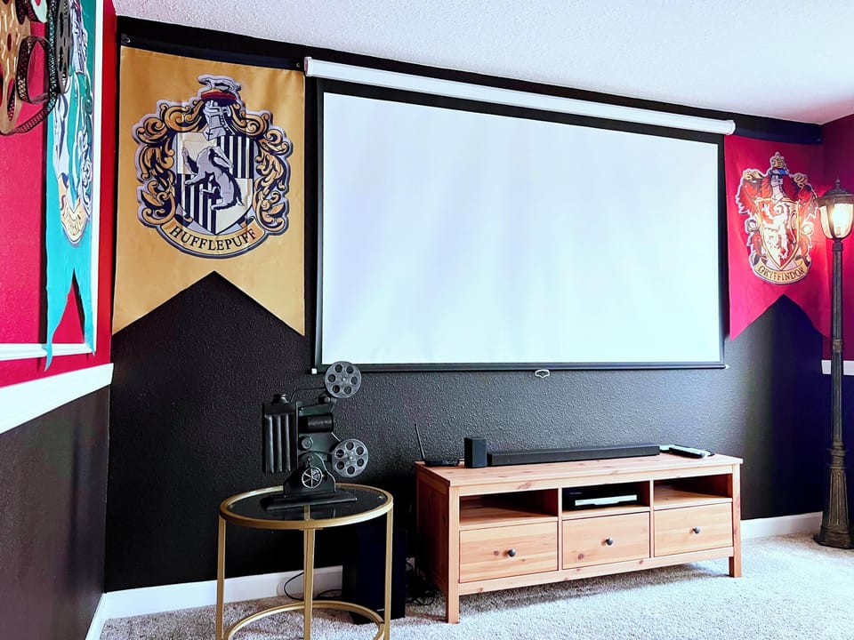 Enjoy all the action on the large projector screen!