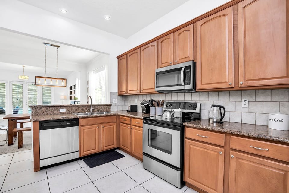 A fully stocked kitchen with stainless steel appliances and all the tools you need to cook comfortably during your stay.