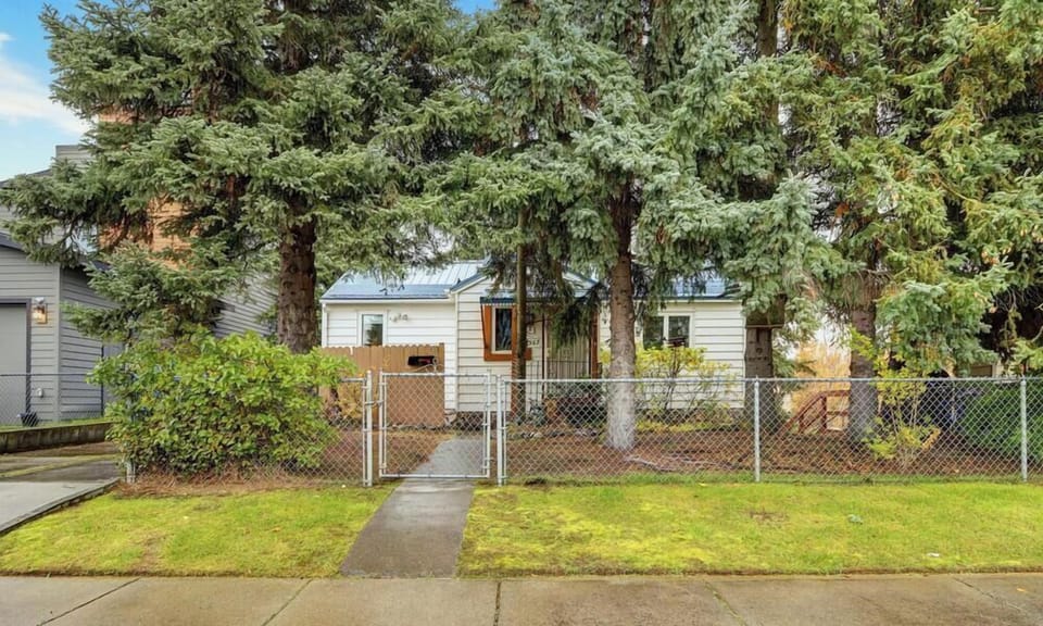 Hidden amongst the trees is a beautifully renovated 1950's cottage.