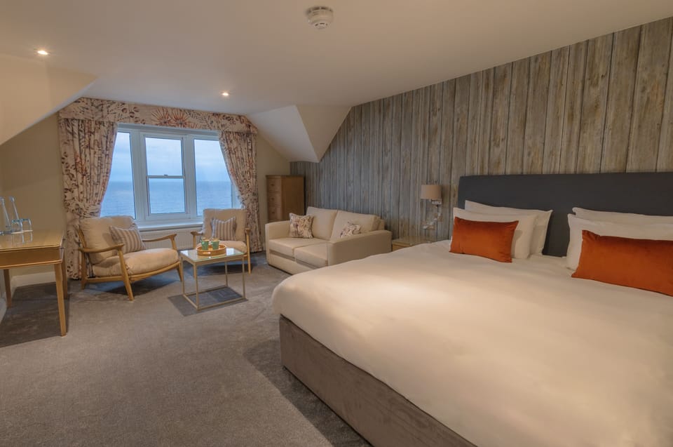 Superior Double or Twin Room, Sea View | Living area | LCD TV
